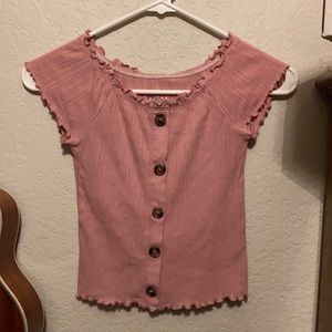 A pink justice ruffle short shirt